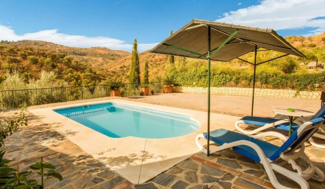 Classy Holiday Home in Guaro with Private Swimming Pool