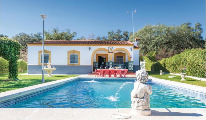 Amazing home in Guillena with 4 Bedrooms, WiFi and Outdoor swimming pool