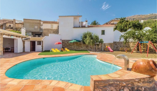 Amazing home in Periana with 4 Bedrooms, Outdoor swimming pool and Swimming pool