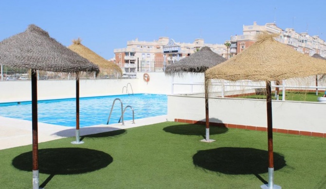 SOL Y PLAYA ROQUETAS-Ático con piscina, solarium y garaje